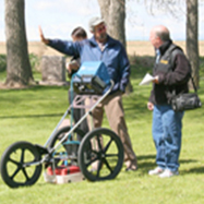 DU Professor Lawrence conyer explains to a Greeley Tribune reporter how the GPR machine works.