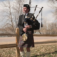 Scott Beach playing the bagpipes