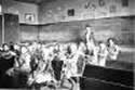 1880s class photo of students inside the Highlandlake school.